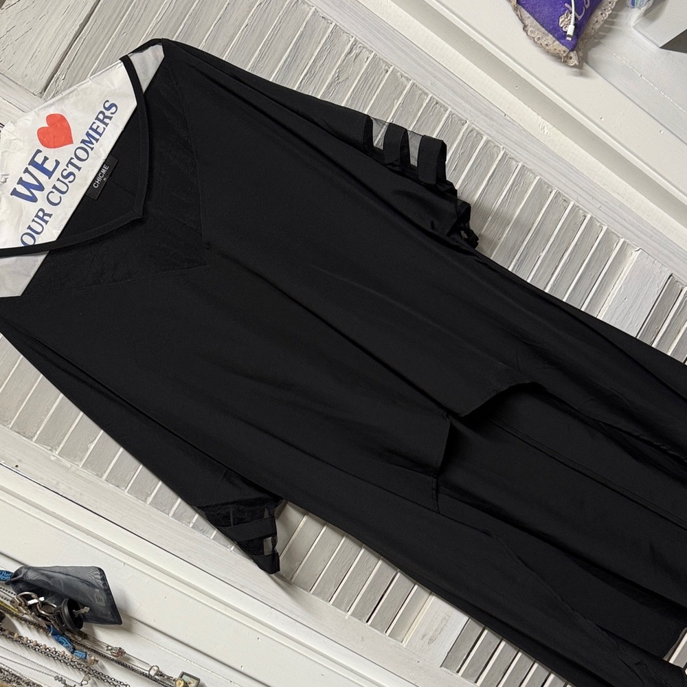 Chic Black Dress with Sheer Striped Sleeves